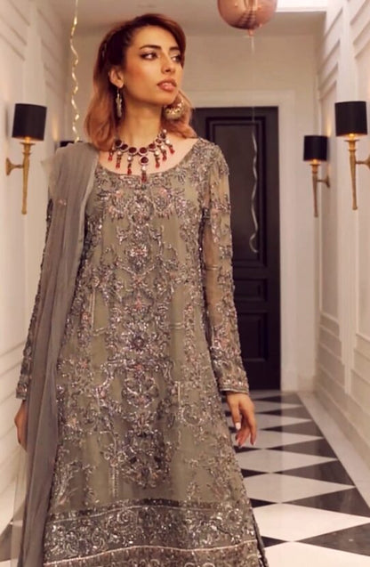 Embroidered Shirt Paired with a Shalwar and Dupatta