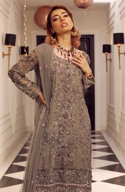 Embroidered Shirt Paired with a Shalwar and Dupatta