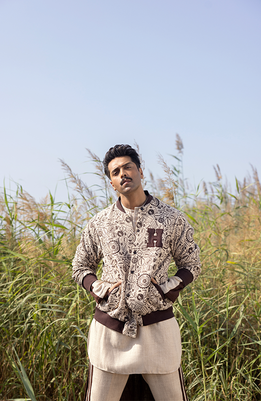 Straight Jute Kurta Paired with Pants and a Varsity Jacket by HSY