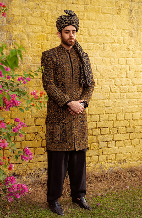 Dastaan - Exquisite Black Silk Sherwani adorned with Antique Gold, Teal & Beige Embroidery