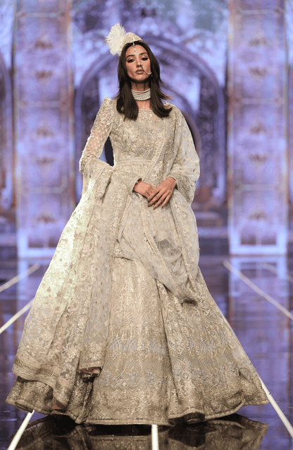HSY | BCW-02 - Net Peplum Lehenga Ensemble-Elegant BCW-02 net peplum lehenga ensemble with embroidery, front view.