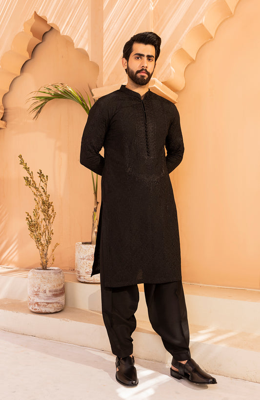 Front view of black embroidered kurta shalwar kameez for men