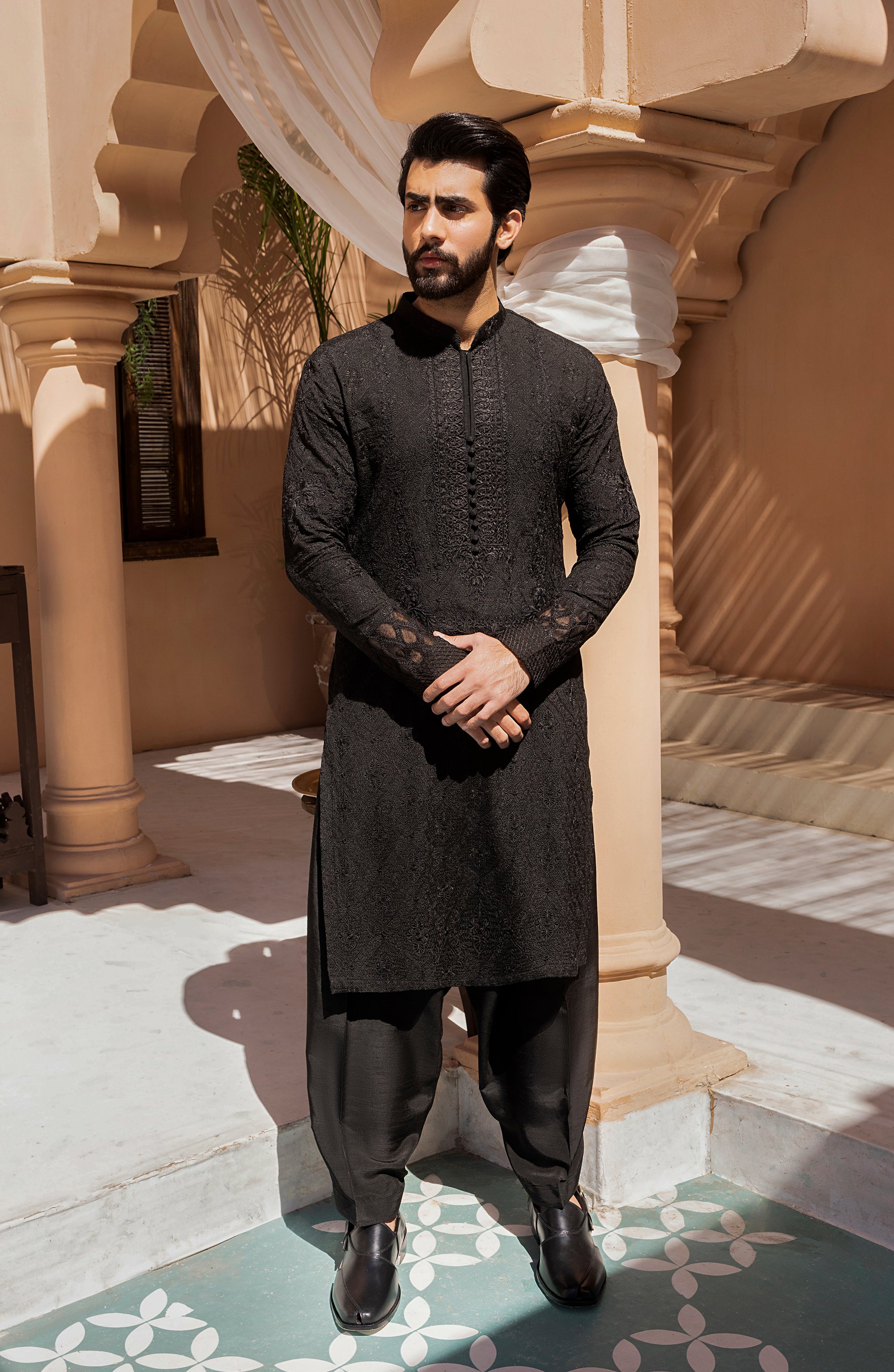 Neckline embroidery design on black kurta shalwar kameez