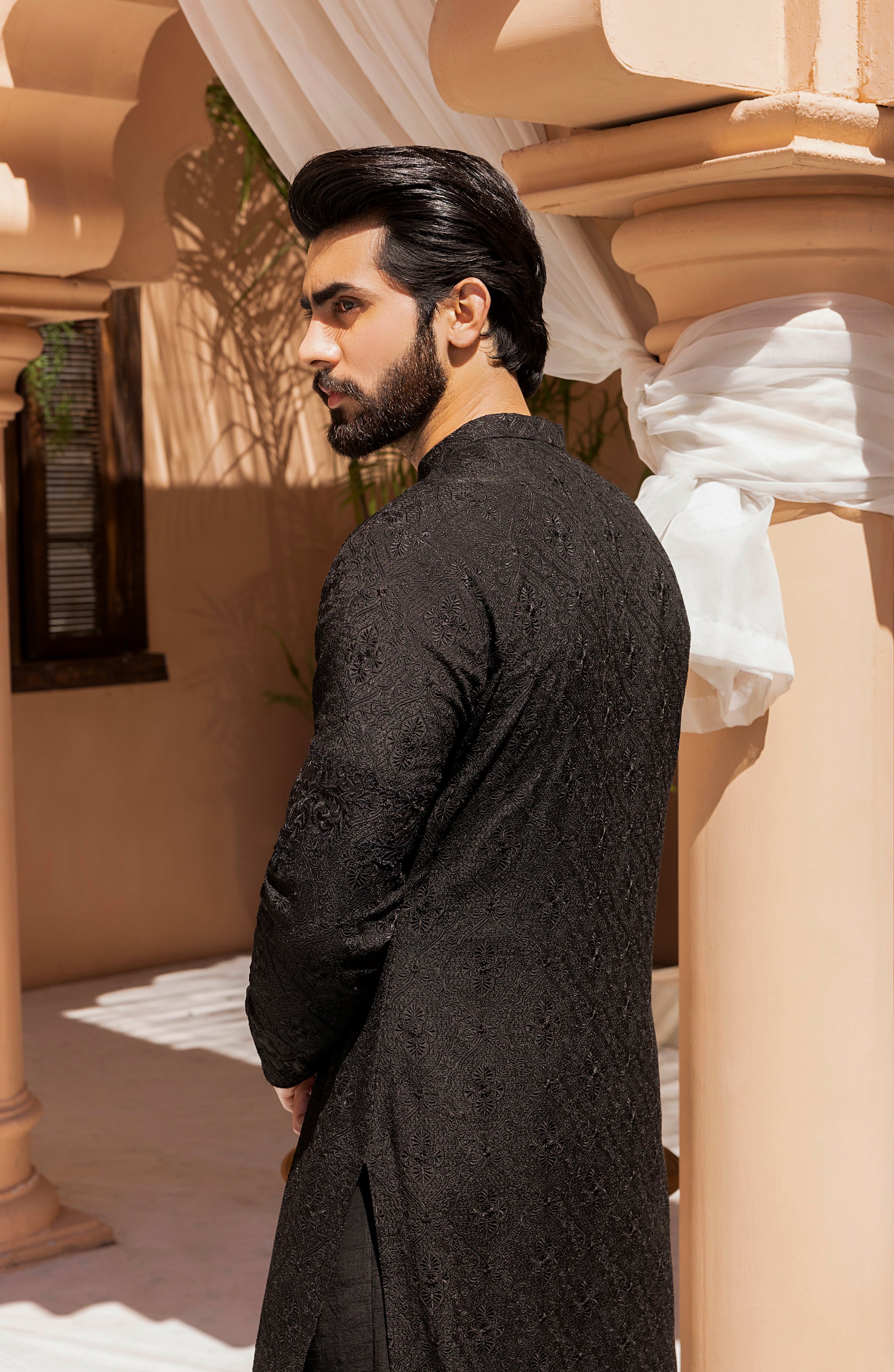 Sleeve embroidery detail of black traditional kurta shalwar