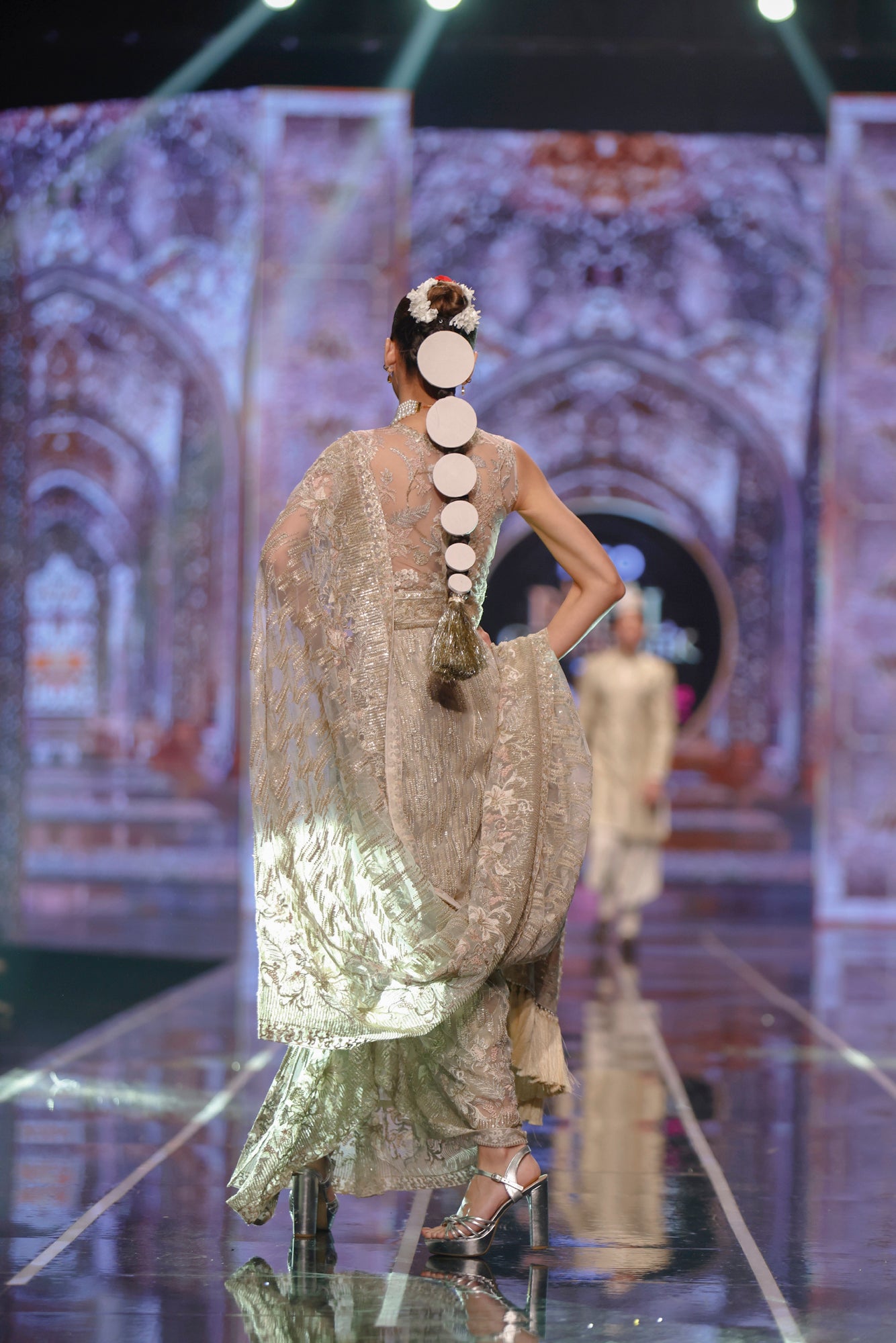 Pakistani bridal saree online by HSY-Model wearing contemporary stitched saree in trendy style