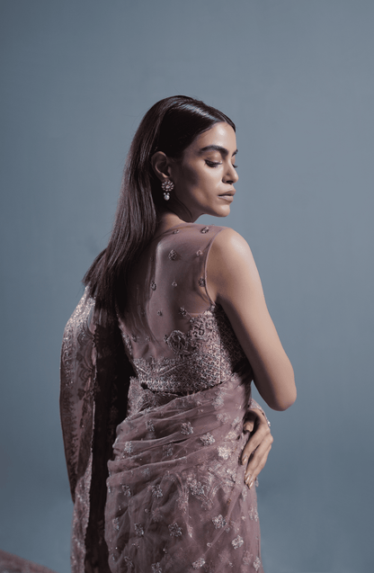 Dusty Rose Pakistani Saree designs in trend-Closeup view of rich embroidery and handcrafted details on net saree.