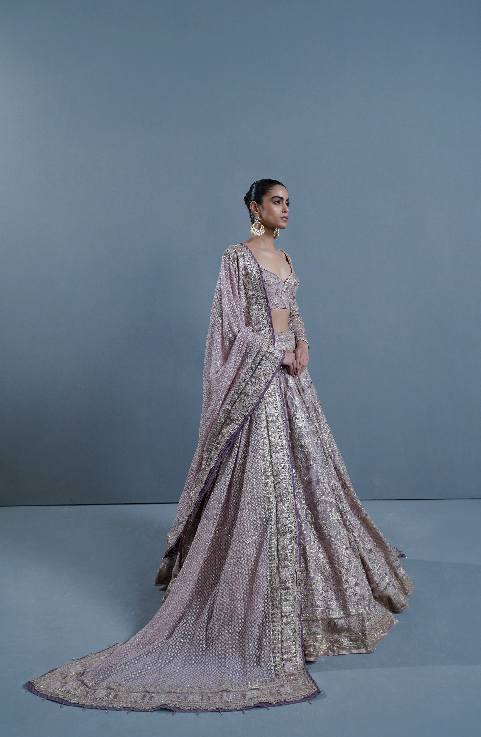 HSY Trousseau wedding Lehenga Choli in USA-Side profile of lavender haze lehenga highlighting graceful drape.