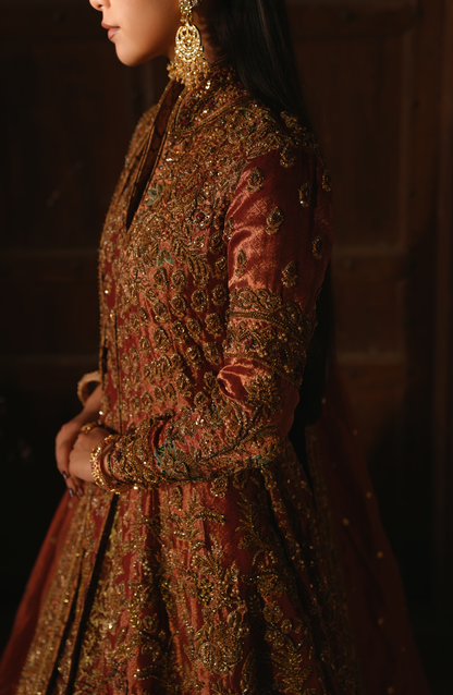 HSY | wedding formal dresses-Side profile of Mahjabeen copper-rust jacket ensemble showing fine fit.
