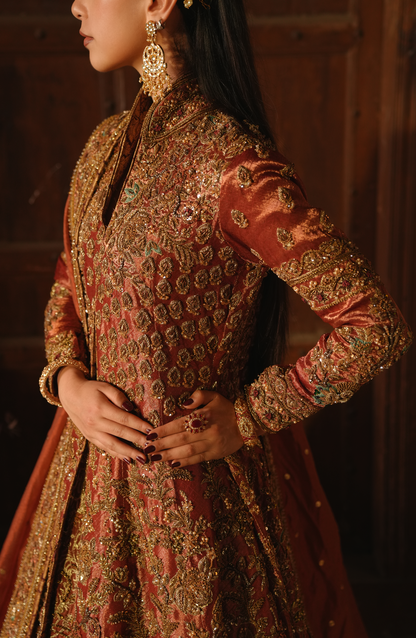 HSY | designer wedding formal -Side profile of Mahjabeen copper-rust jacket ensemble showing fine fit.