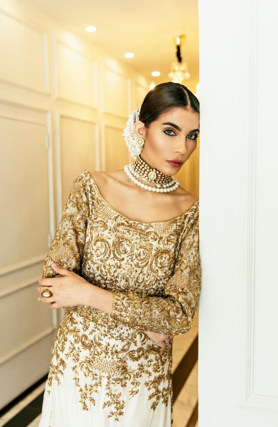 Bridal Scoop-back Mermaid Gown with a Trail and Net Mukesh Veil-Side profile of Meherbano Mermaid Gown with elegant trail