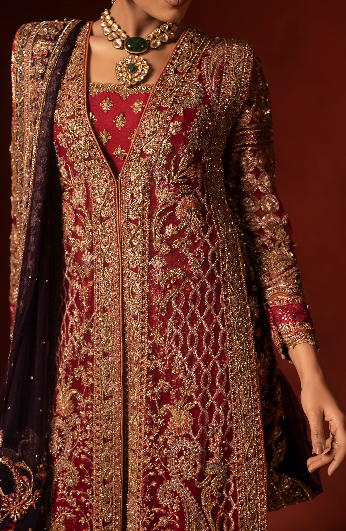 Full outfit view of red shirt with azaar pants for women