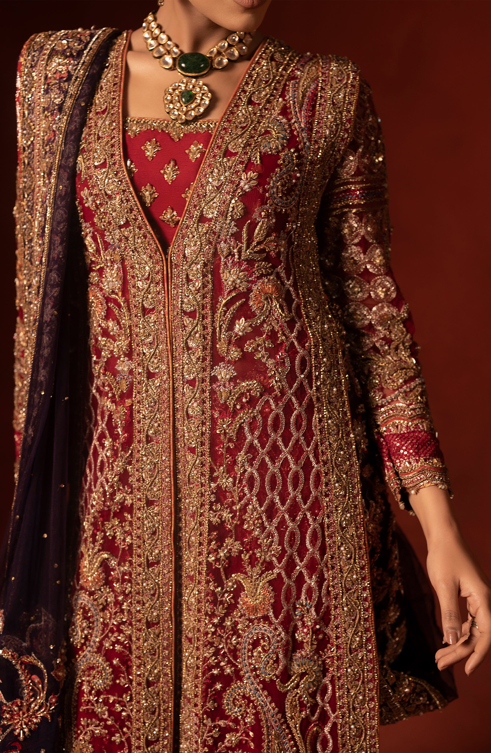 Full outfit view of red shirt with azaar pants for women