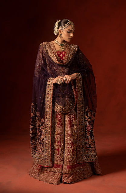 Model showcasing red front open shirt with azaar pants
