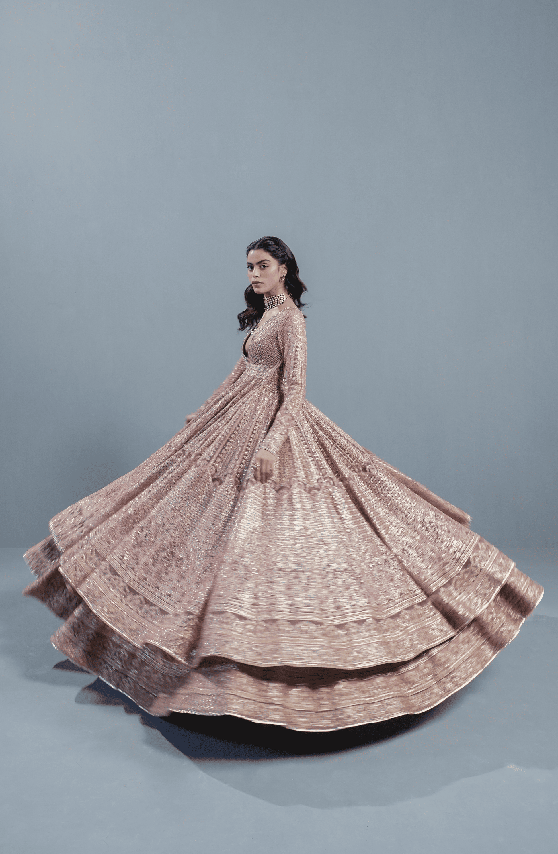 Indian wedding dresses USA-Model styling Rose Gold embroidered pishwas lehenga set