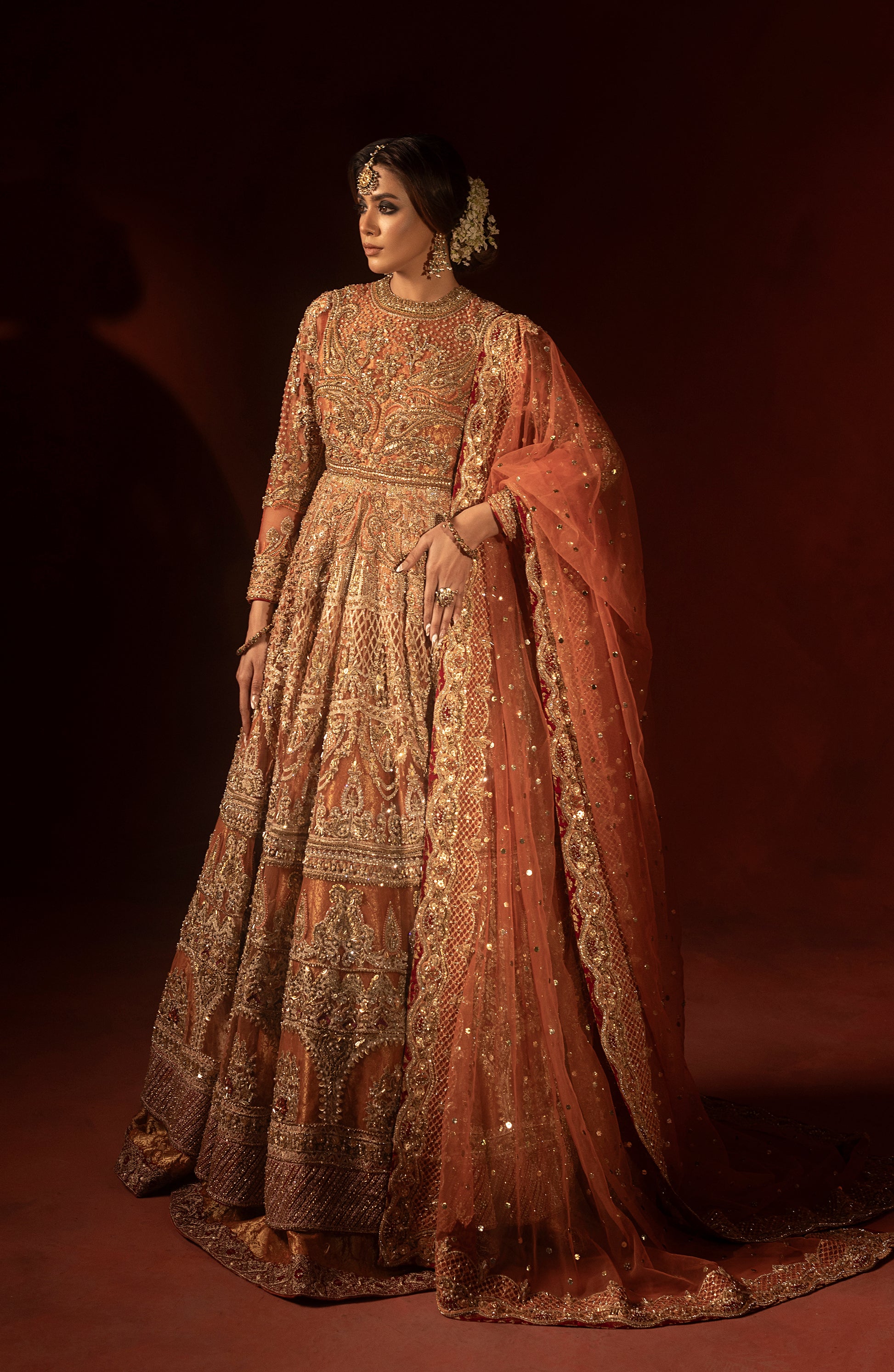 Rust orange ethnic pishwas lehenga set for bridal wear