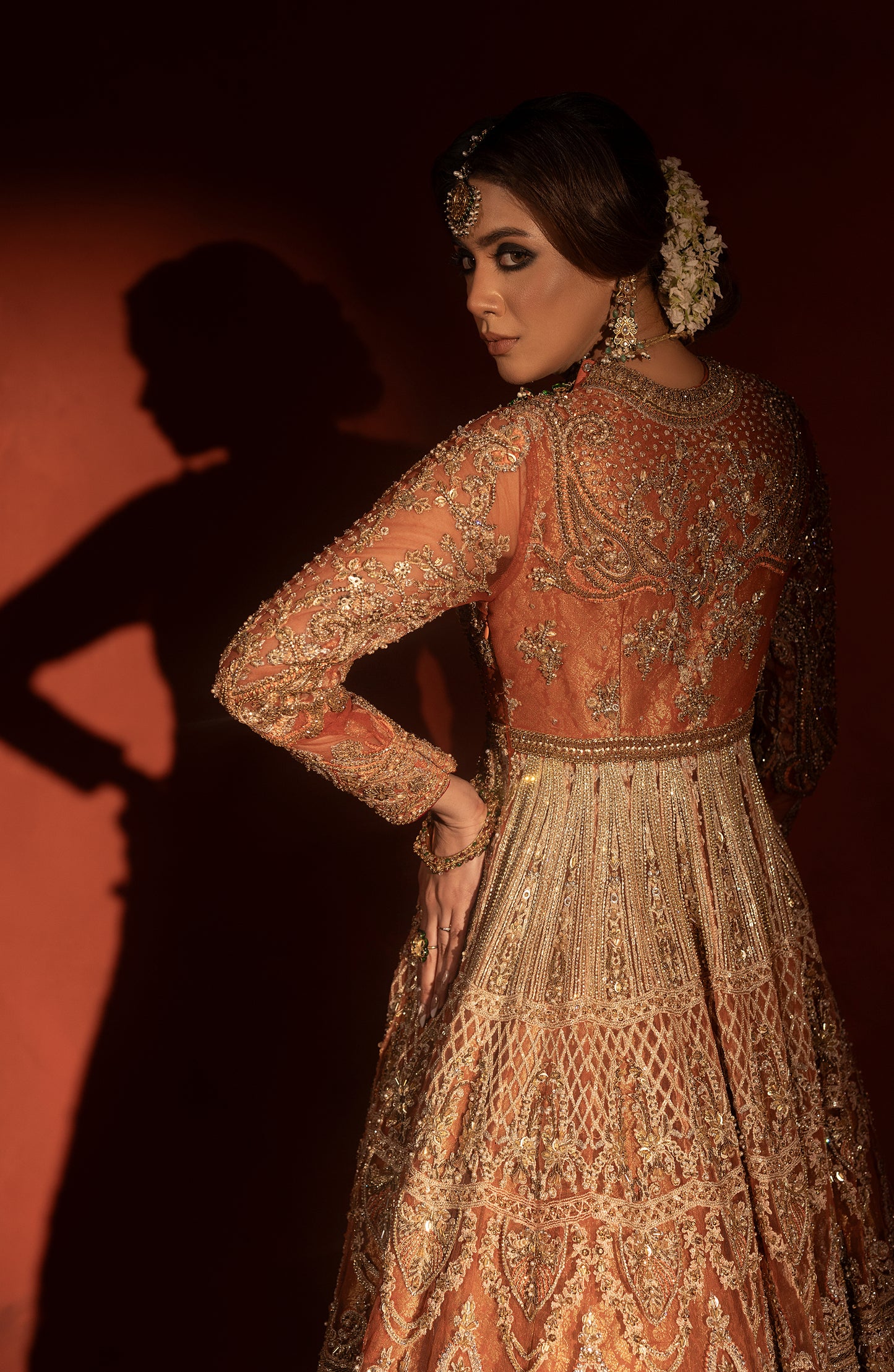Rust orange bridal pishwas and jamawar lehenga for weddings