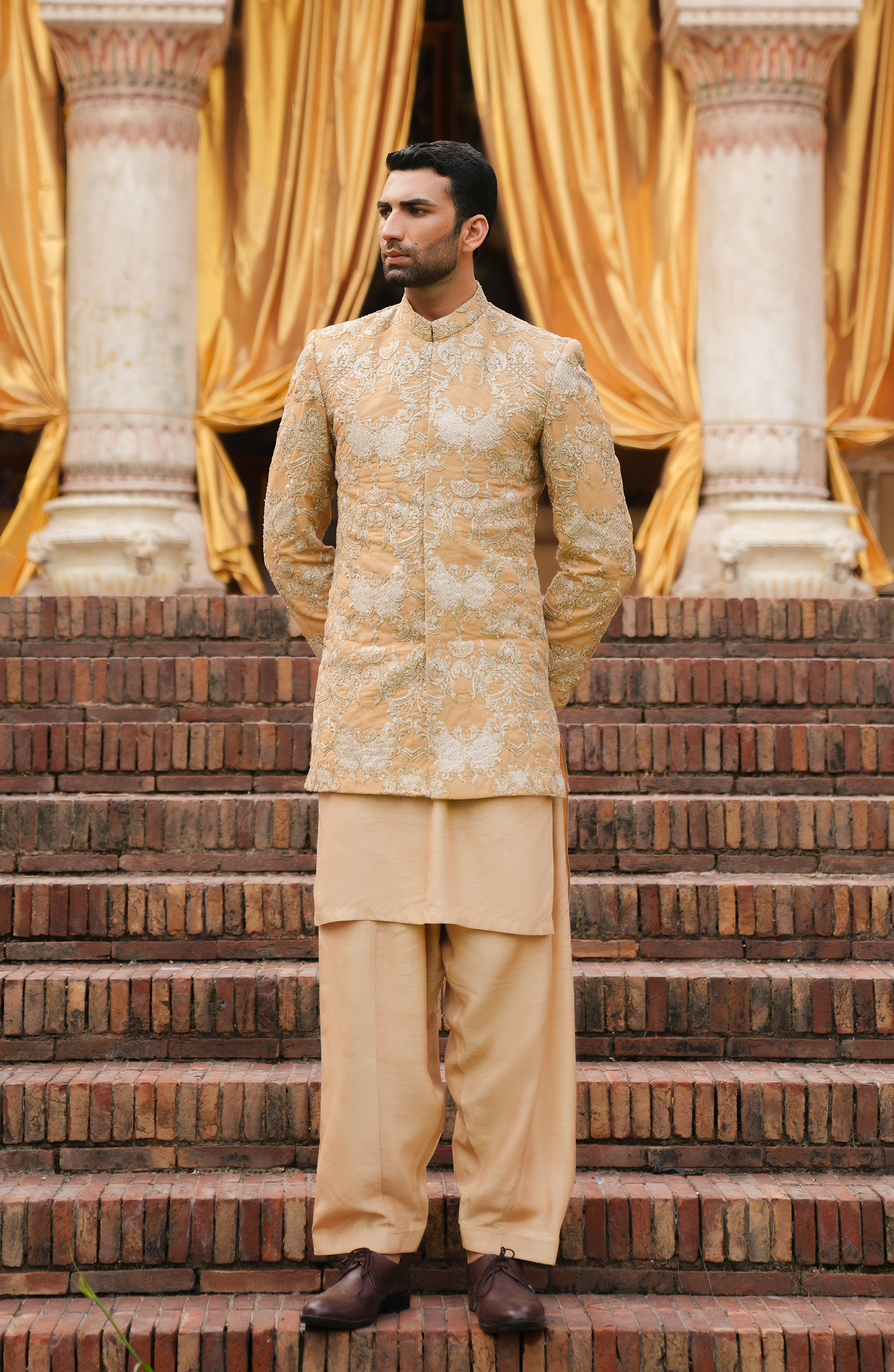 HSY Designer Prince Coat for Men in Pakistan-Side profile of elegant beige prince coat with kurta shalwar