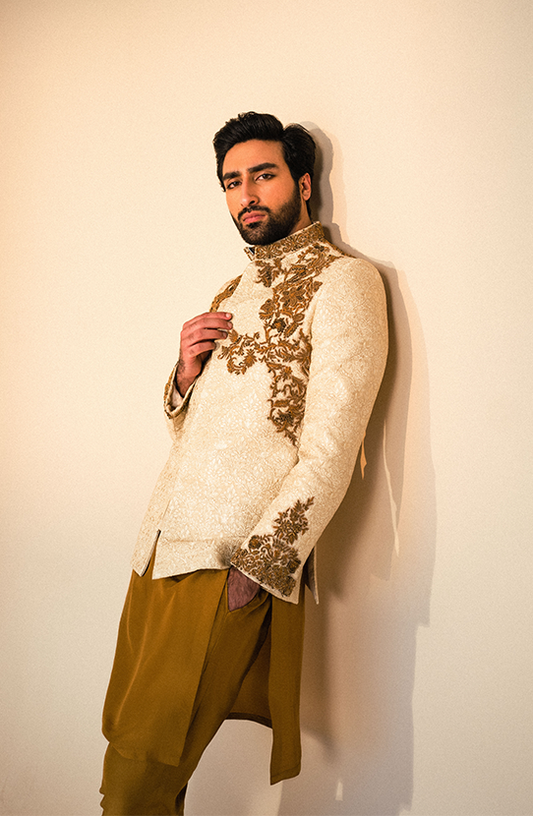Rustam – Off-White Prince Coat Paired with a Mustard Kurta and Pants