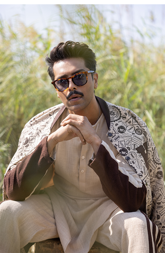 Straight Jute Kurta Paired with Pants and a Varsity Jacket by HSY